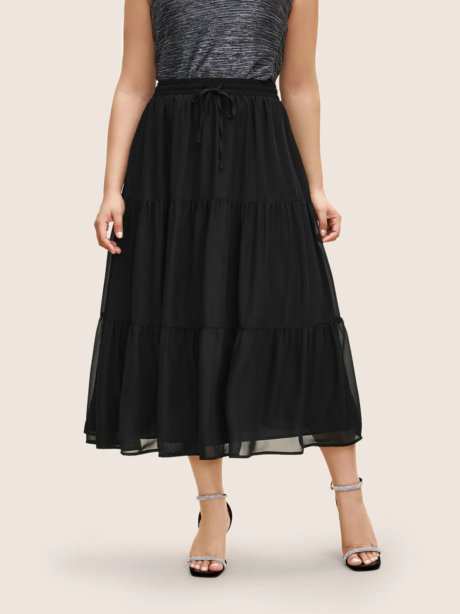 Solid Tie Knot Elastic Waist Mesh Skirt sold by Bloomchic