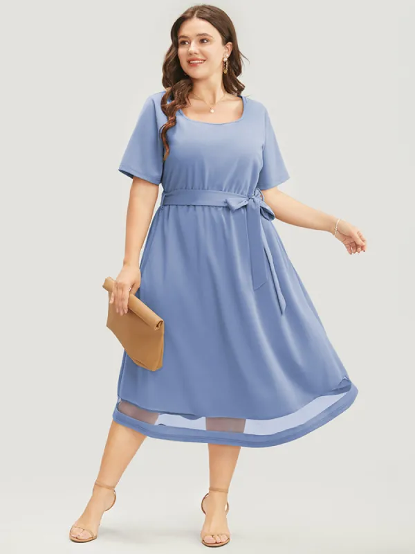 Solid Mesh Insert Pocket Belted Flutter Hem Dress sold by Bloomchic