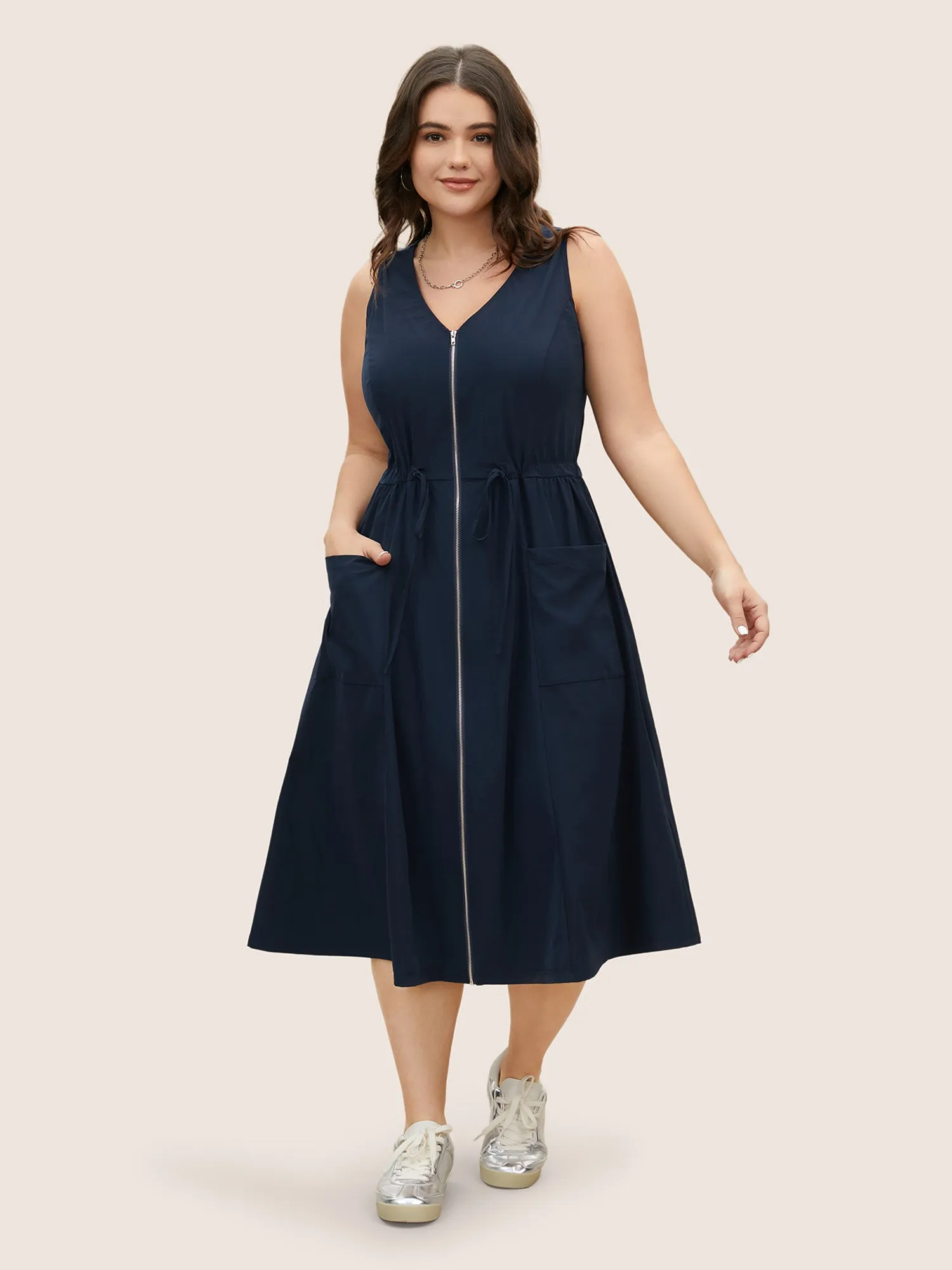 Solid Zip Front Patch Pocket Sleevless Dress sold by Bloomchic