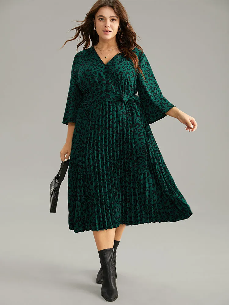 Leopard Wrap Elastic Waist Pleated Belted Dress sold by Bloomchic