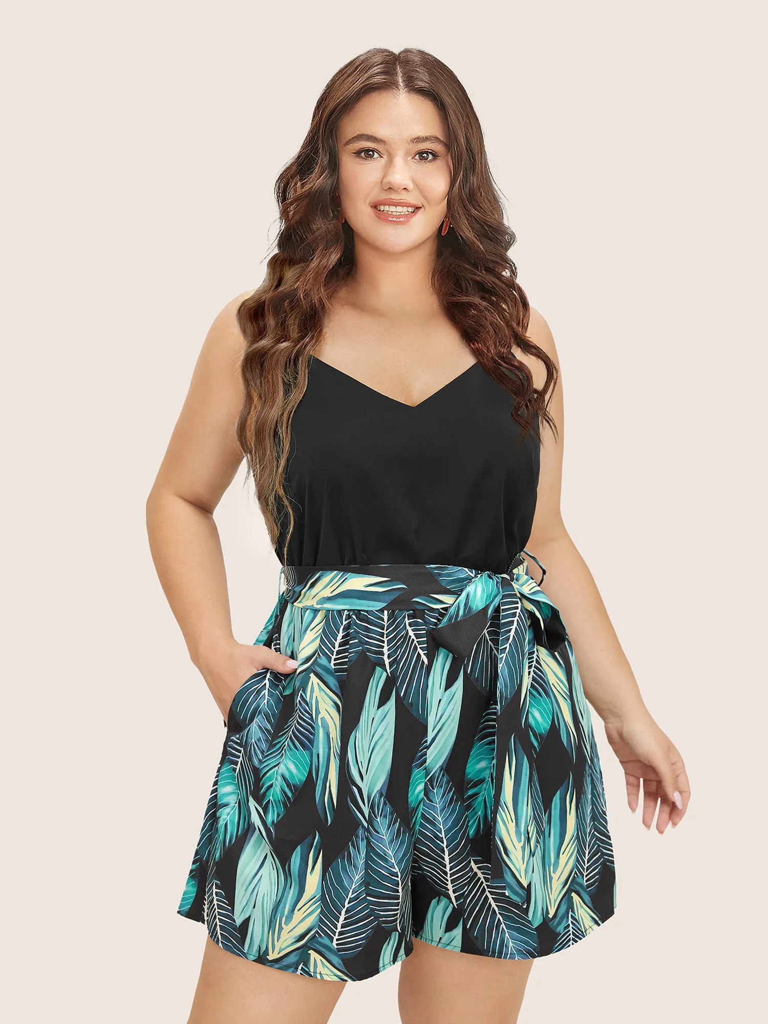 Tropical Patchwork Pocket Belted Cami Romper sold by Bloomchic