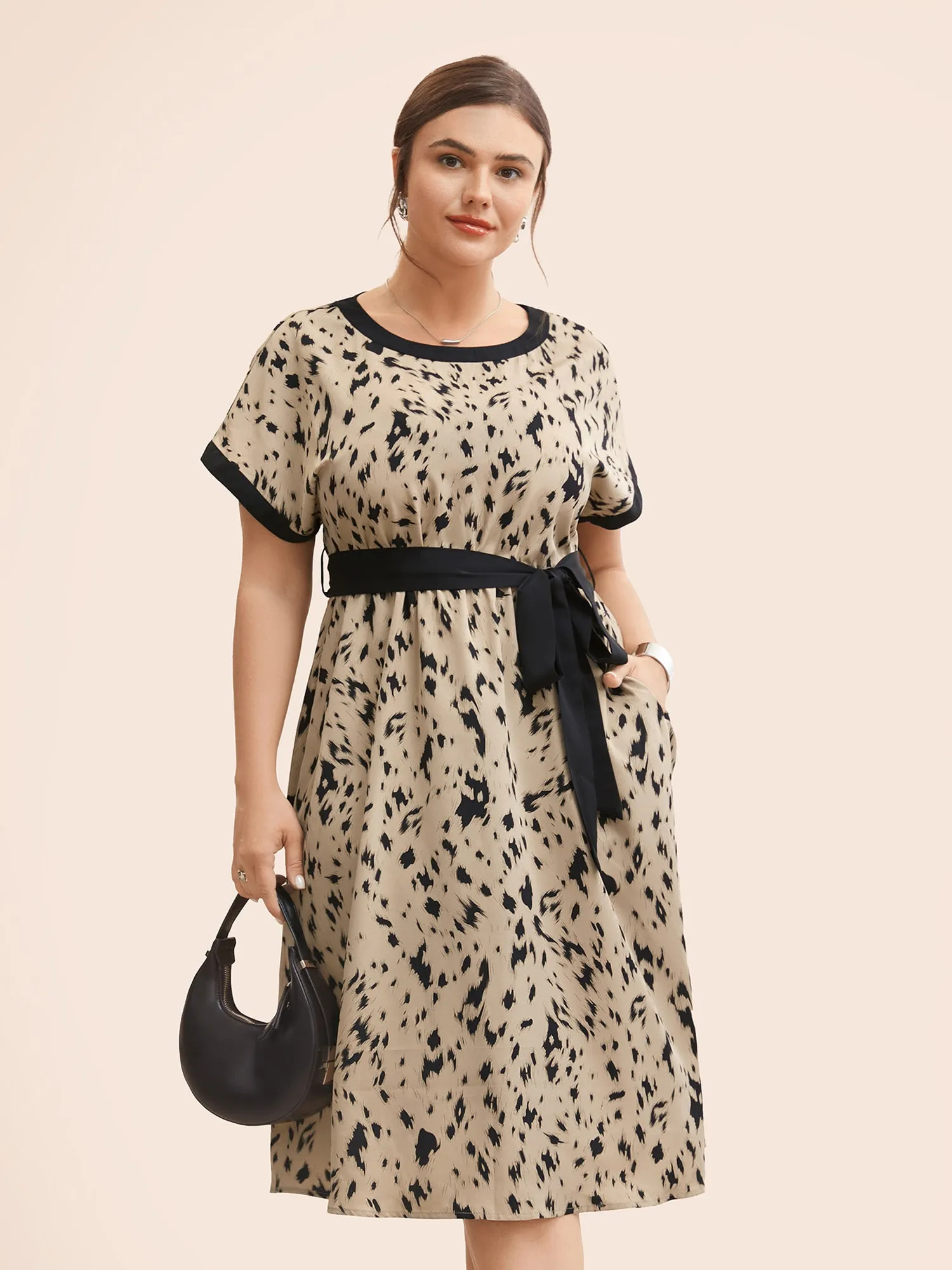 Leopard Print Contrast Trim Dolman Sleeve Dress sold by Bloomchic