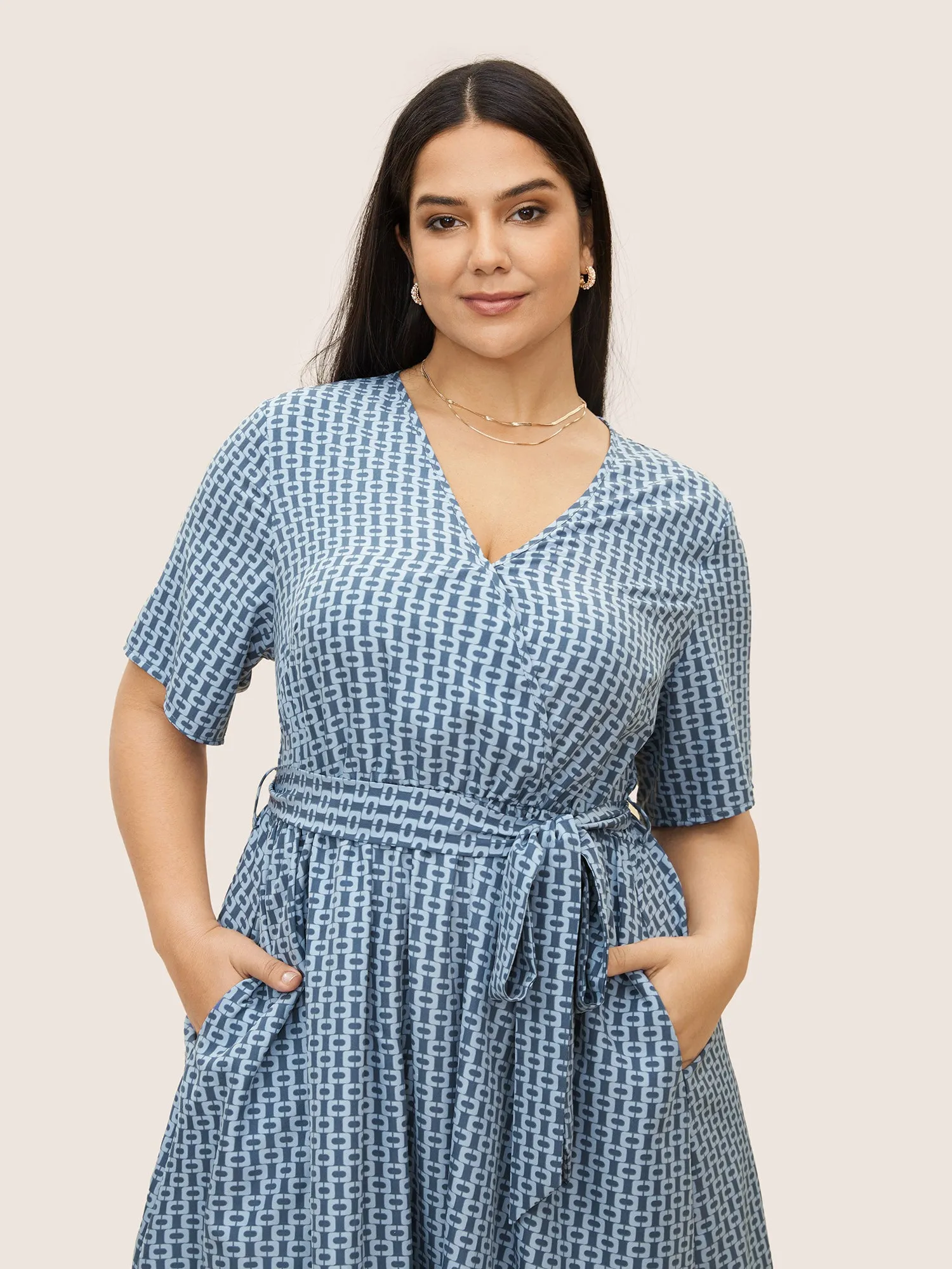 Geometric Overlap Collar Elastic Waist Belted Dress sold by Bloomchic product image thumbnail 2