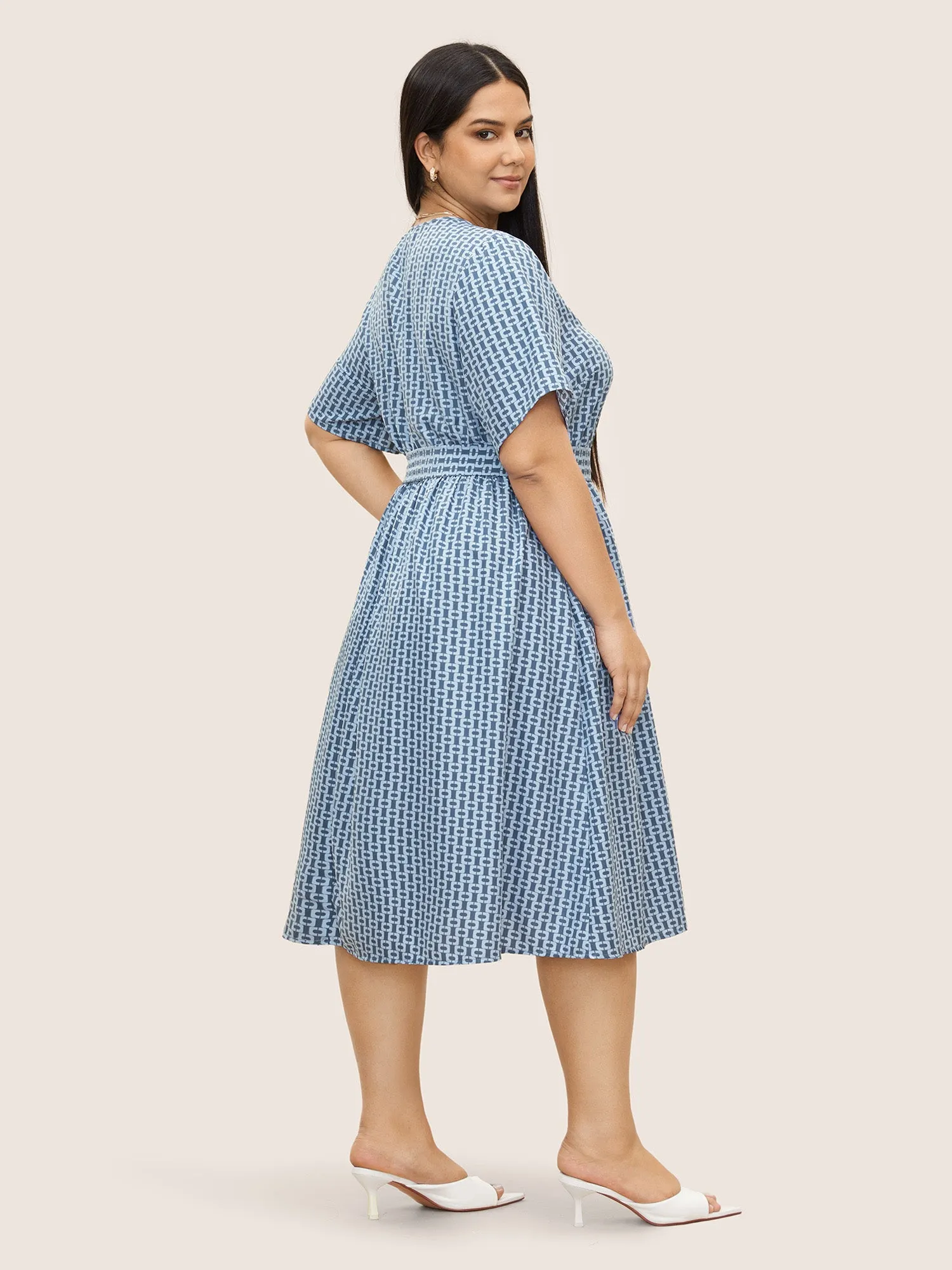 Geometric Overlap Collar Elastic Waist Belted Dress sold by Bloomchic product image thumbnail 4