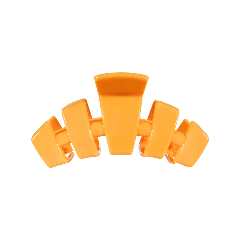 Classic Mango for it! Medium Claw Hair Clip sold by TELETIES