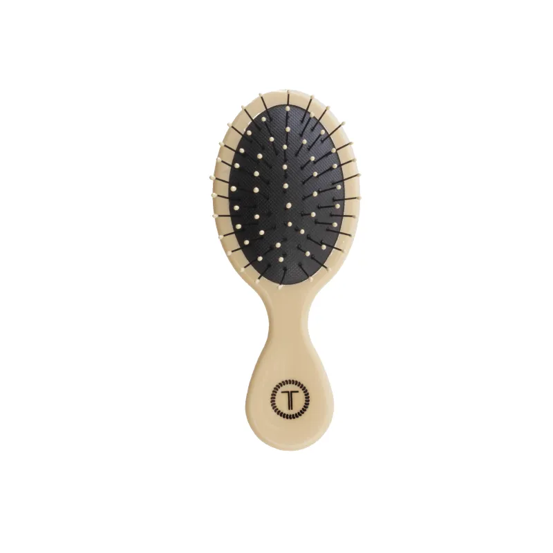 Tan Mini Hair Brush made by TELETIES