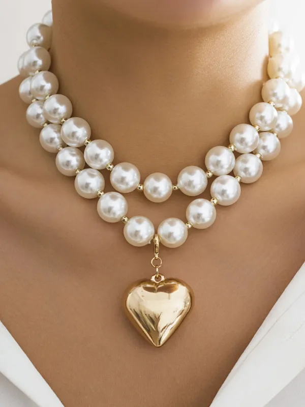 Vintage Pearl Heart Pendant Necklace sold by Retro Stage