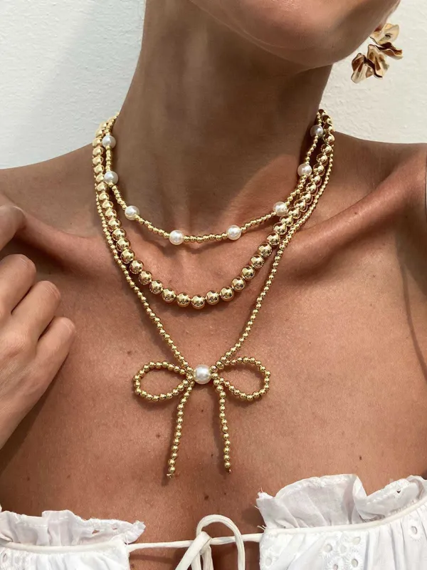 Retro Pearl Beads Bow Layered Necklace sold by Retro Stage