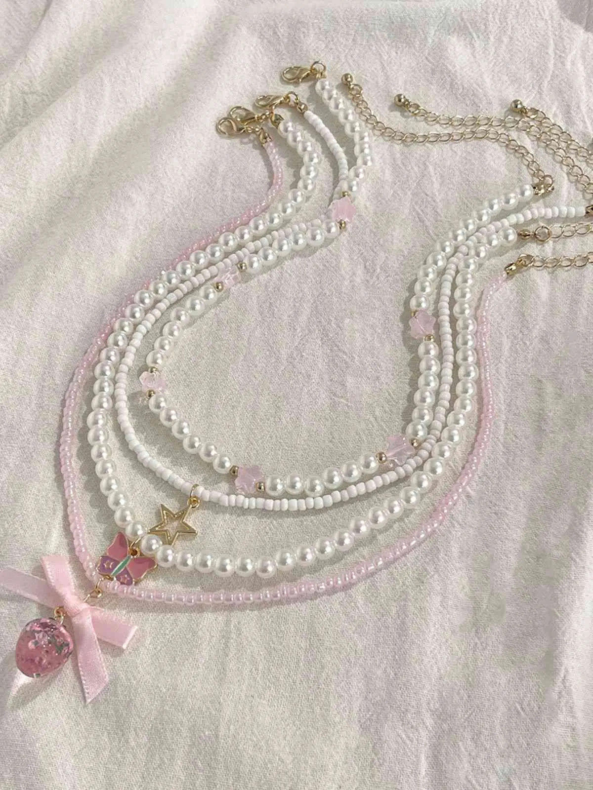 Pink & White Pearl Bow Butterfly Necklace Set sold by Retro Stage product image thumbnail 5