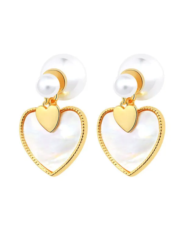 Vintage Gold Edged Pearl Heart Earrings sold by Retro Stage
