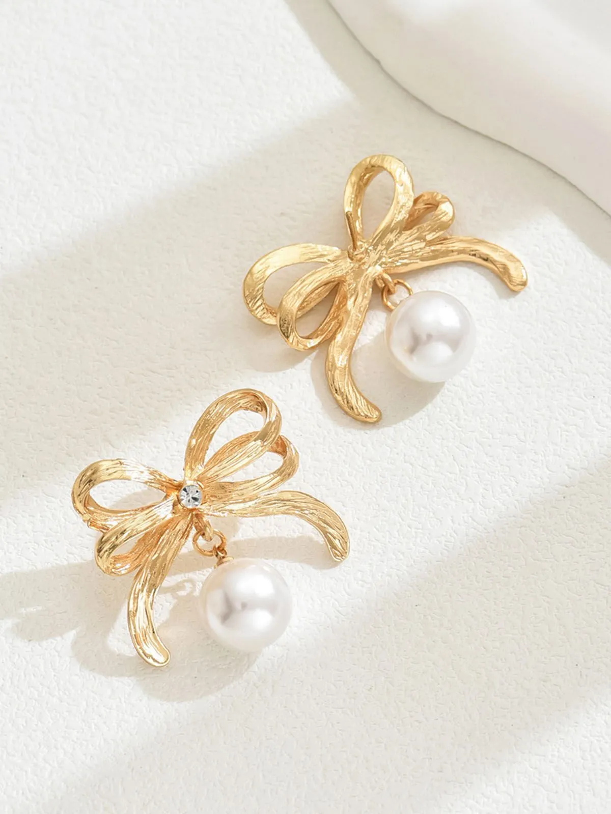 Gold Bowknot Pearl Alloy Drop Earrings sold by Retro Stage