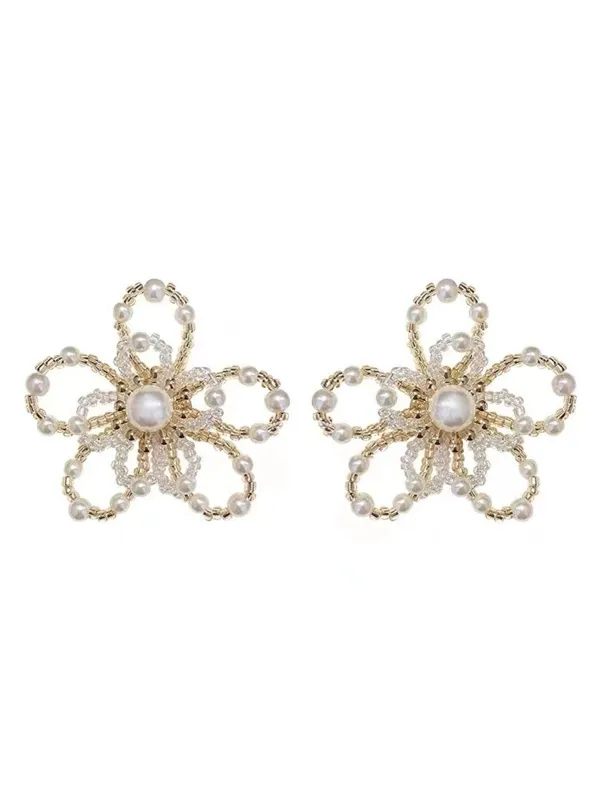 White Retro Beading Flower Hollow Stud Earrings sold by Retro Stage