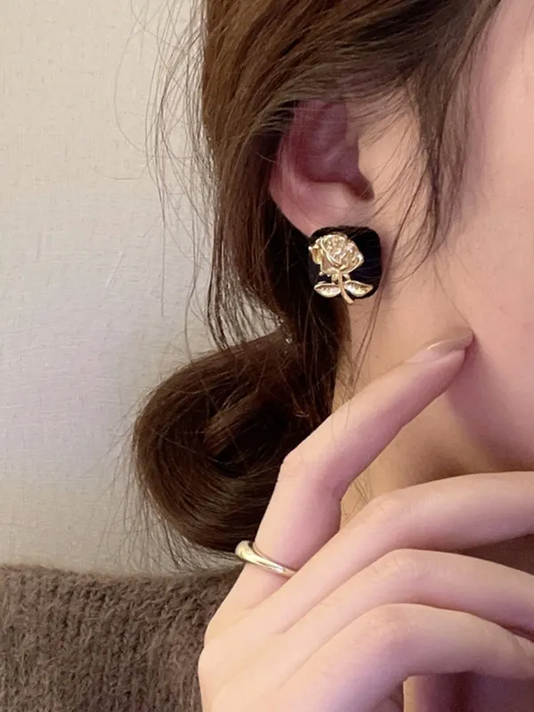 Vintage Black & Gold Cubic Flower Earrings sold by Retro Stage