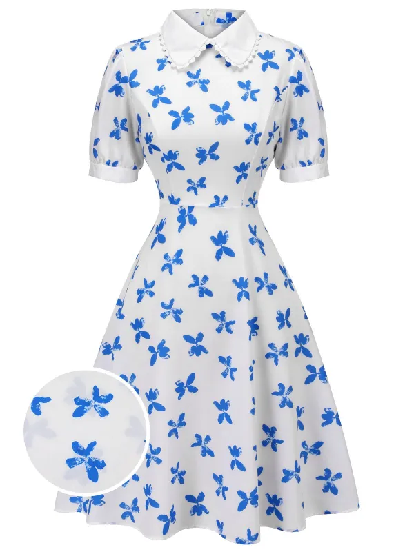 1940s Blue Butterfly Doll Neck Dress sold by Retro Stage