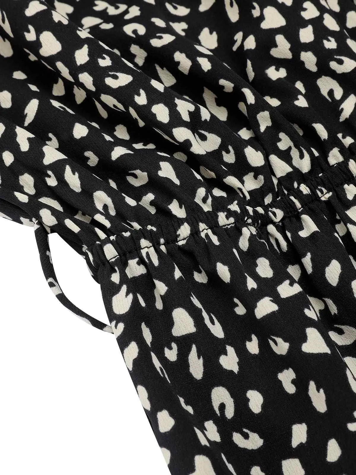 Black 1950s Printed V-Neck Belted Romper sold by Retro Stage product image thumbnail 5