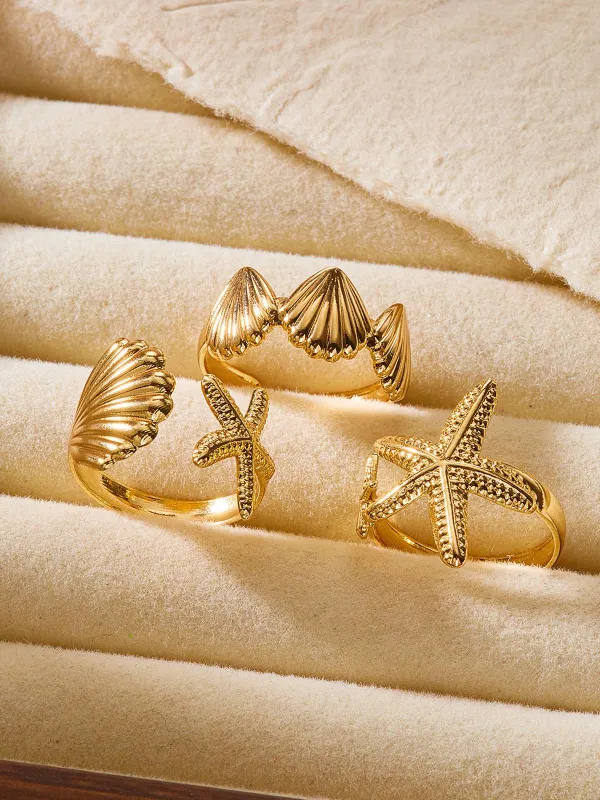 Gold Seashell Starfish Rings Set sold by Retro Stage