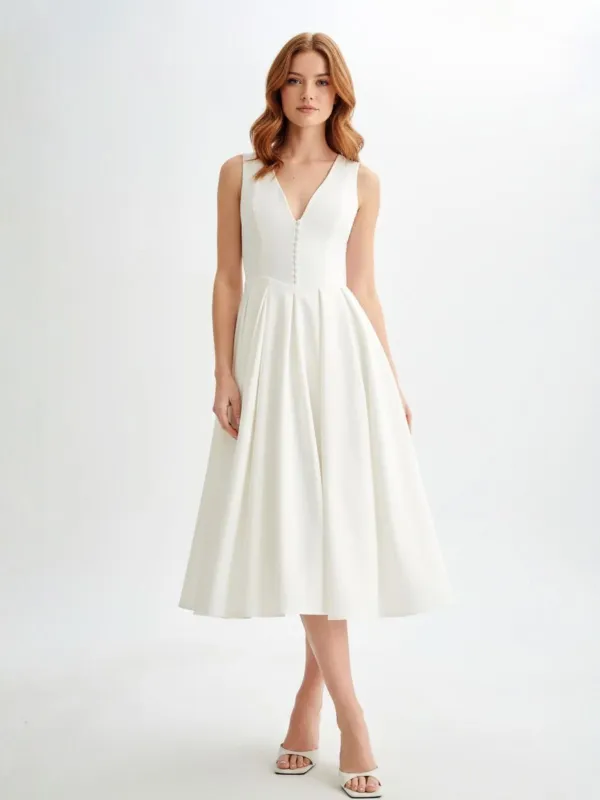 White 1950s Solid Sleeveless V-Neck Button Dress sold by Retro Stage