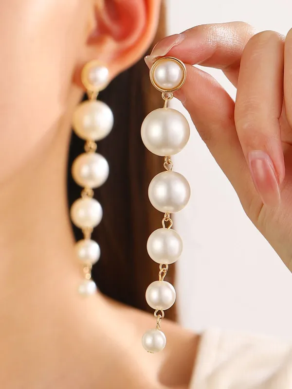 Vintage Gold Tassel Pearl Earrings sold by Retro Stage