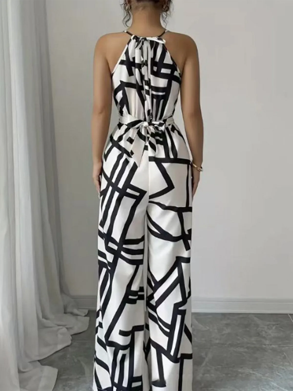White 1970s Abstract Geometric Line Halter Jumpsuit sold by Retro Stage product image thumbnail 4