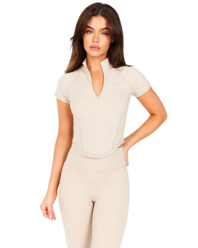 Aura Sculpt Tee - Oat Latte sold by Elite Eleven