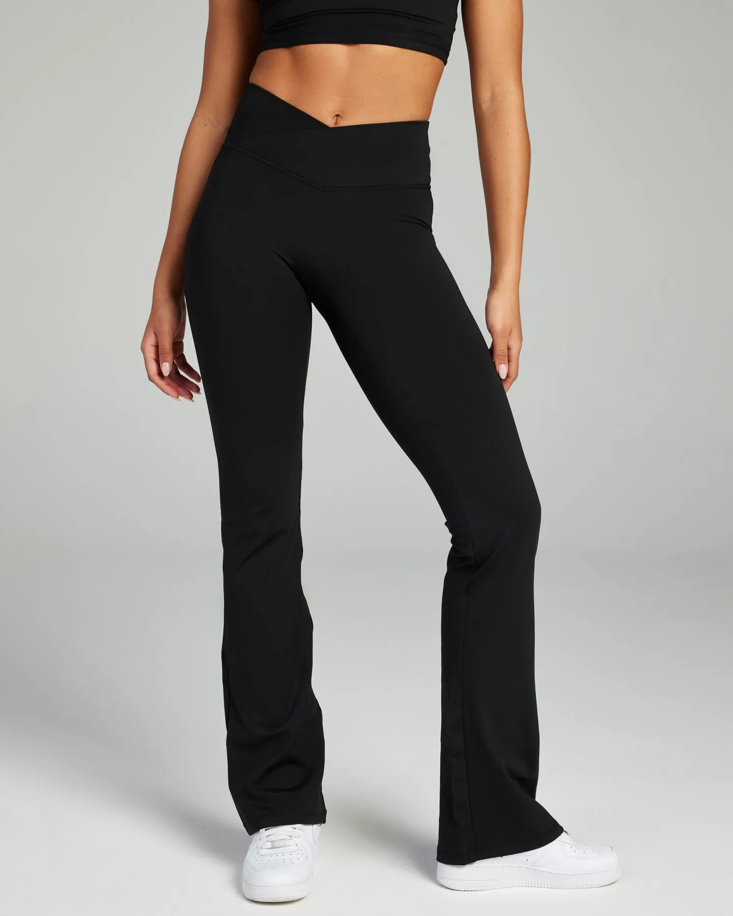 Cross Over Flare Leggings - Black sold by Elite Eleven