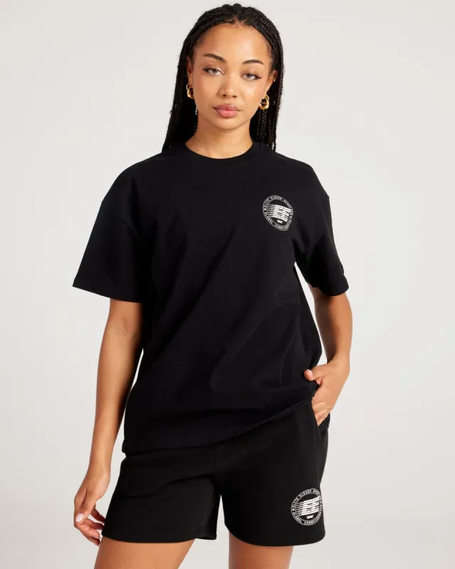 Global Championship Women's Tee - Black sold by Elite Eleven