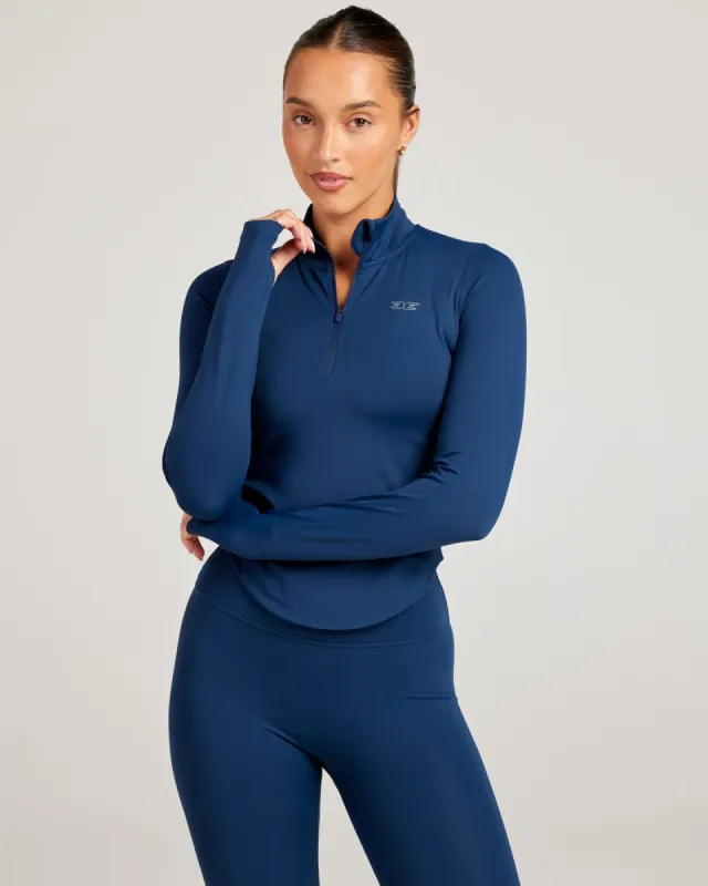 ProForm Curved 1/4 Zip - Navy sold by Elite Eleven