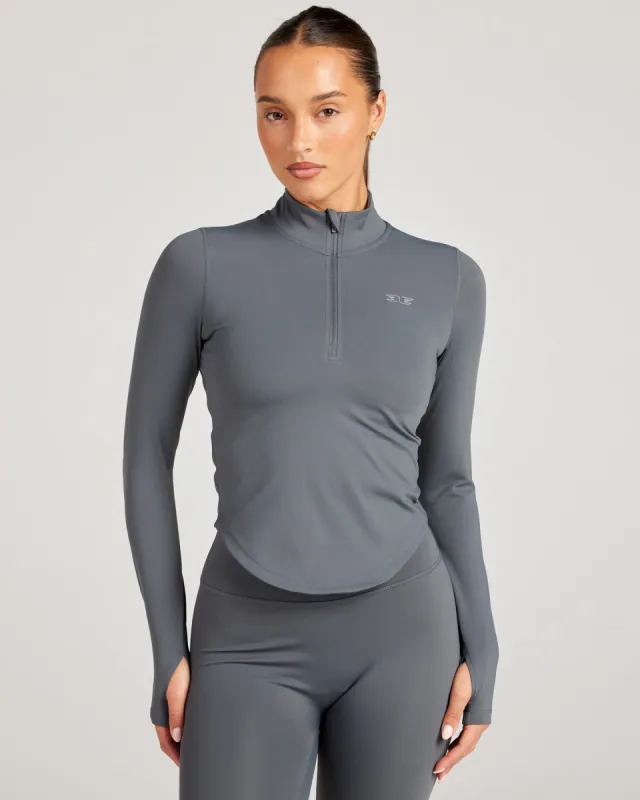 ProForm Curved 1/4 Zip - Grey sold by Elite Eleven