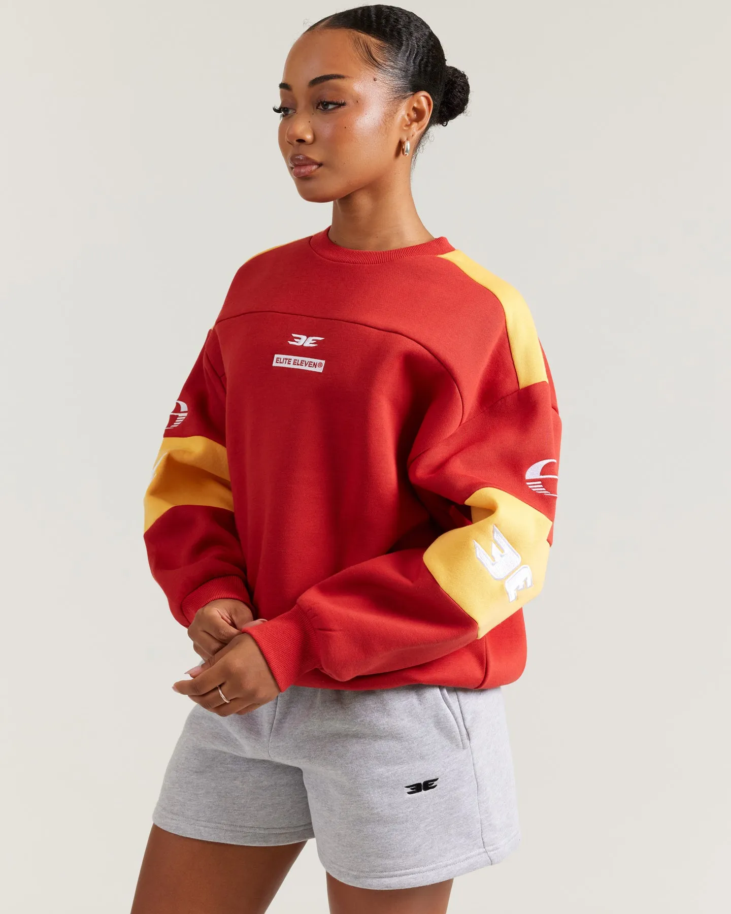 AFL x EE Retro Crewneck - Gold Coast SUNS sold by Elite Eleven product image thumbnail 2