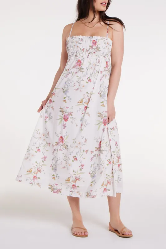 Margot Smocked Spaghetti Strap Midi Dress in White Floral sold by Hermoza