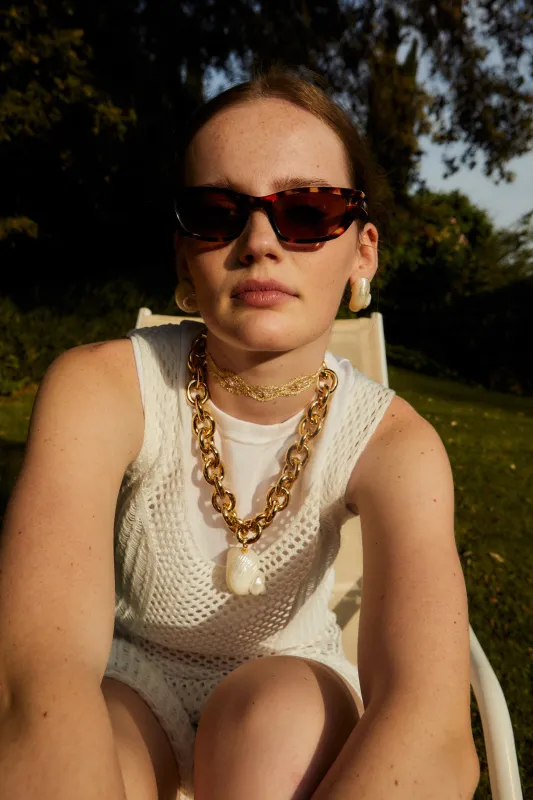 Shell Earrings by CASHFANA sold by Hermoza