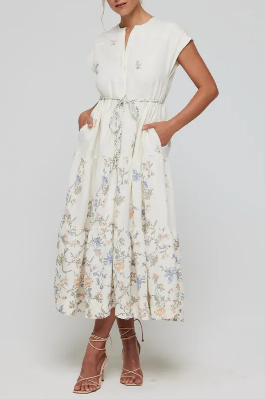 Irma Short Sleeve Tiered Midi Dress in Cream Floral - FINAL SALE sold by Hermoza