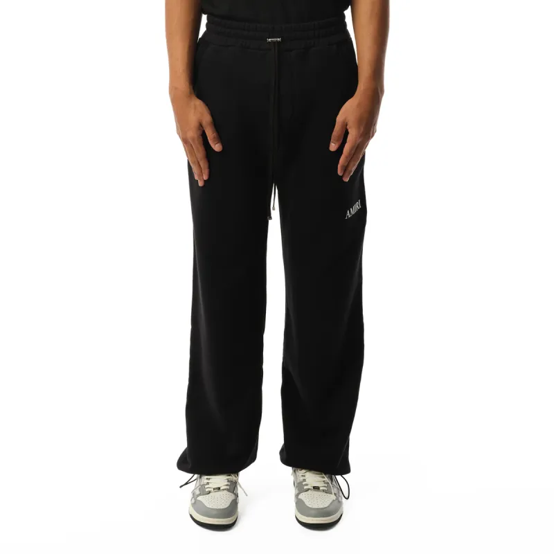 Amiri Core Logo Sweatpants in Black sold by MARAIS