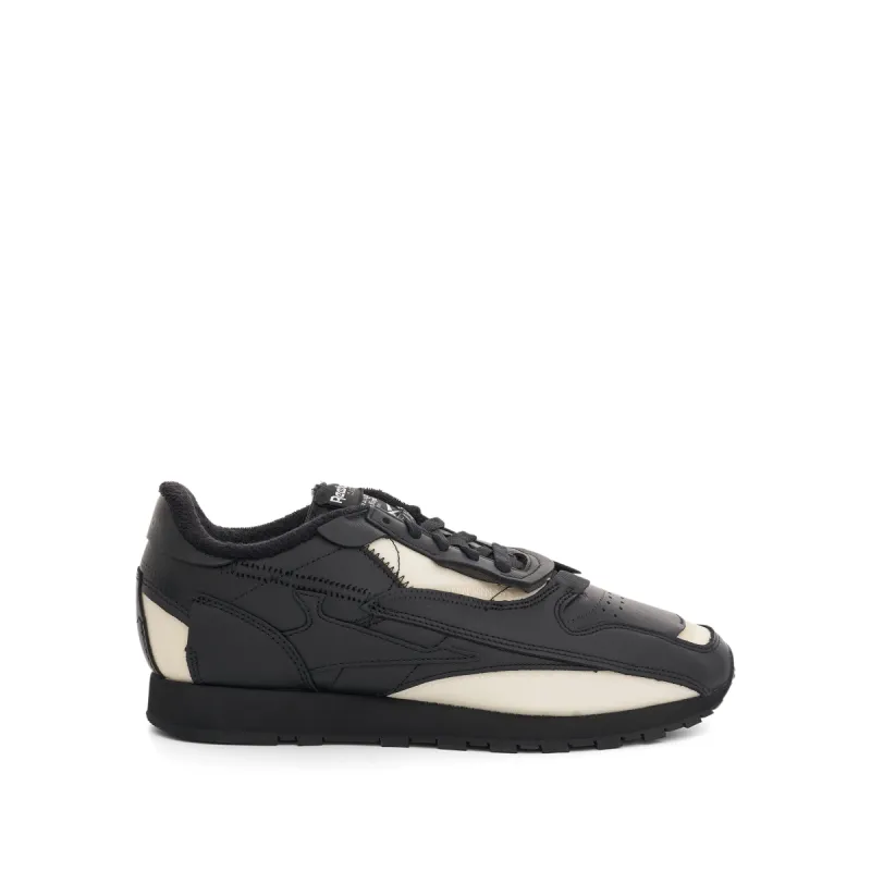 Maison Margiela x Reebok Sneakers in Black sold by MARAIS