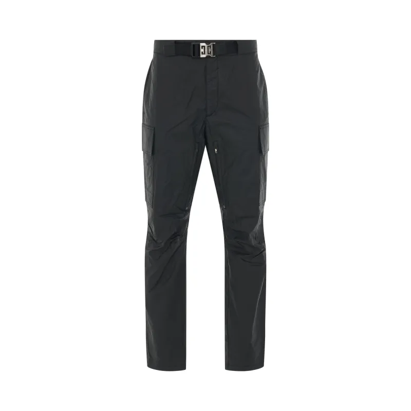 Light Coated Cotton Trousers in Black sold by MARAIS