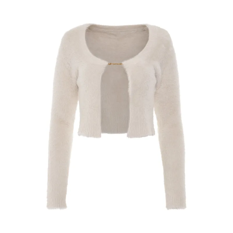 Neve Manches Longues Charm Cardigan in Off White sold by MARAIS