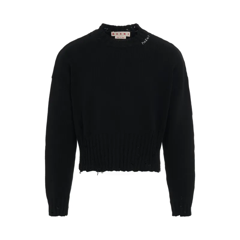 Boxy Destroyed Knit Sweater in Black sold by MARAIS