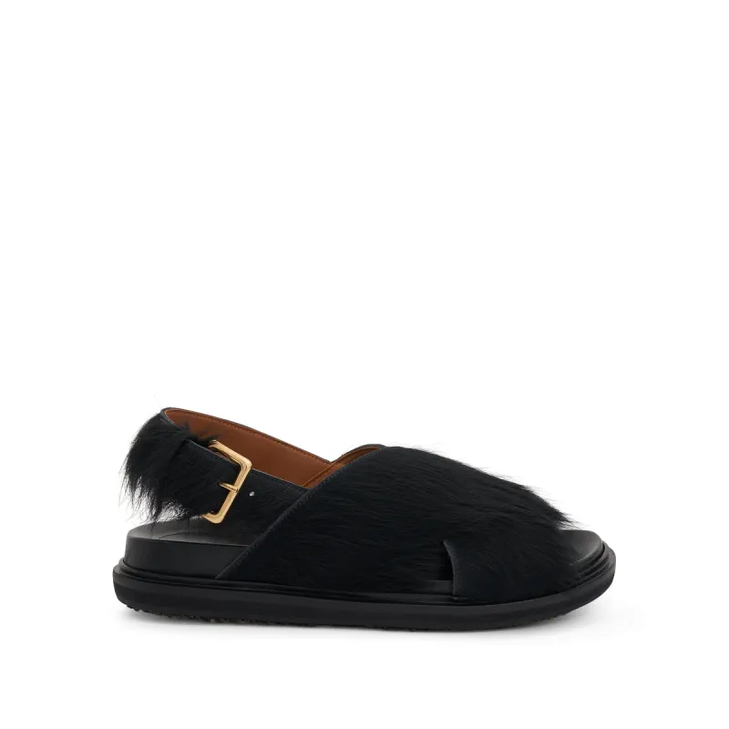 Fussbett Long Hair Calfskin Sandal in Black sold by MARAIS
