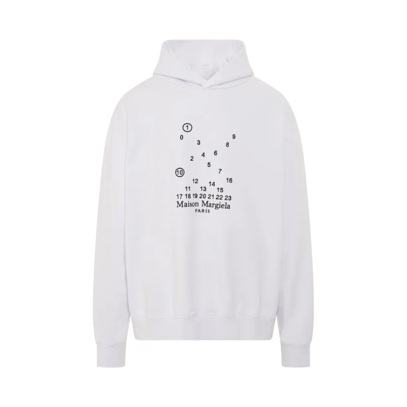 Scattered Numeric Logo Hoodie in White sold by MARAIS