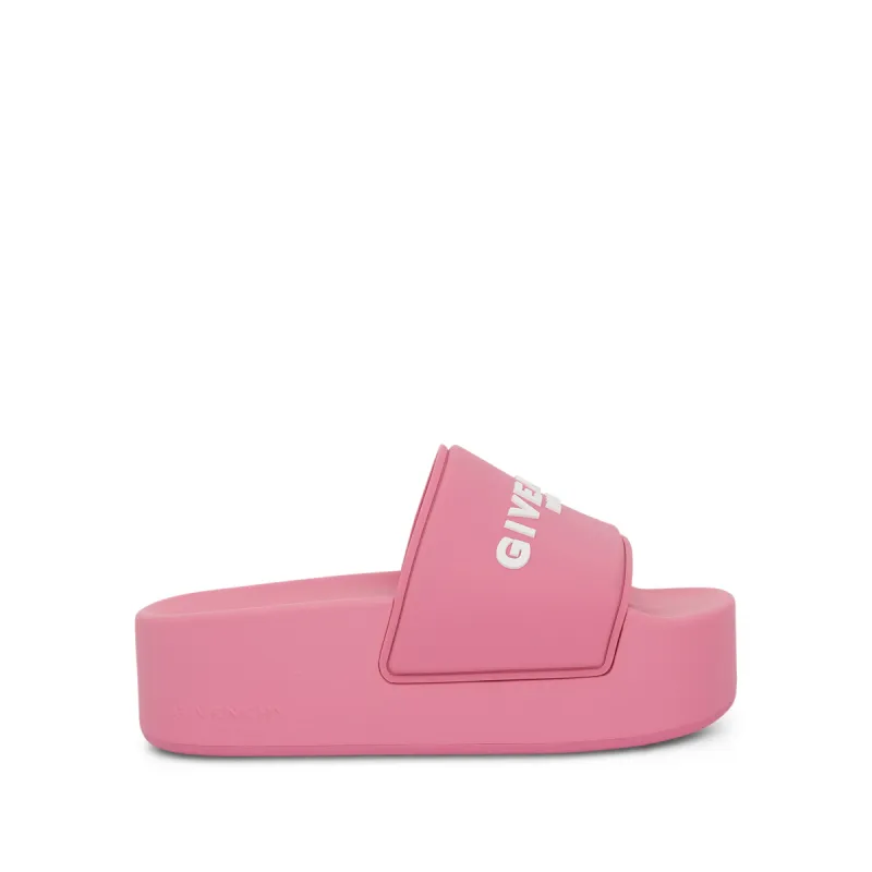 Rubber Slide Sandals in Bright Pink sold by MARAIS