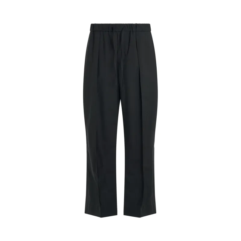 Wool Relaxed Fit Pants in Black sold by MARAIS