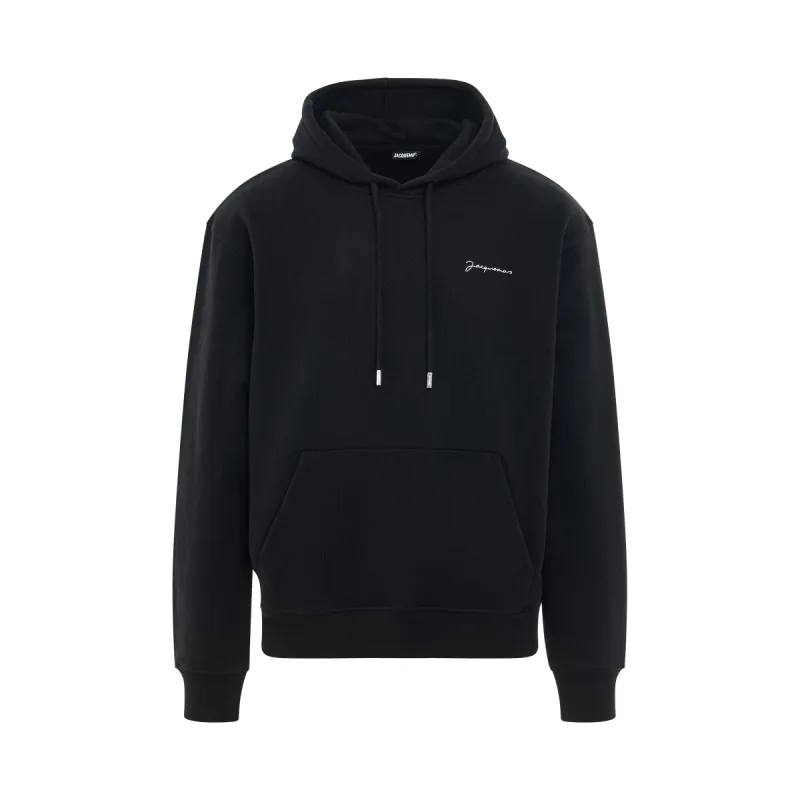 Brode Embroidered Logo Hoodie in Black made by Jacquemus