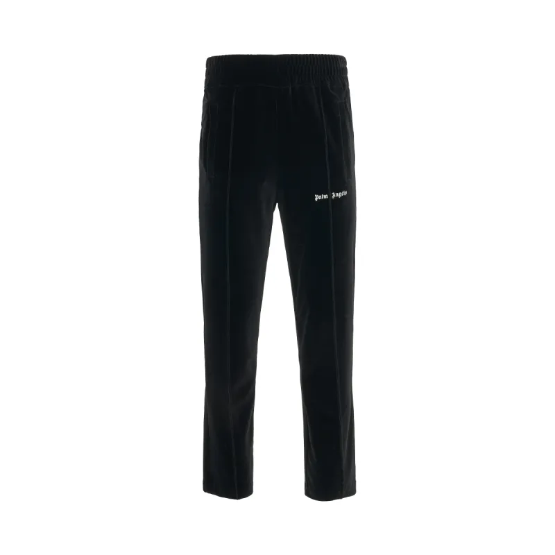 Logo Print Velvet Track Pants in Black sold by MARAIS