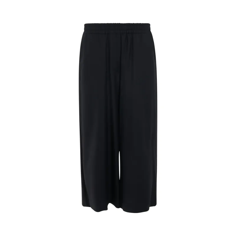 Cropped Wool Trousers in Black sold by MARAIS