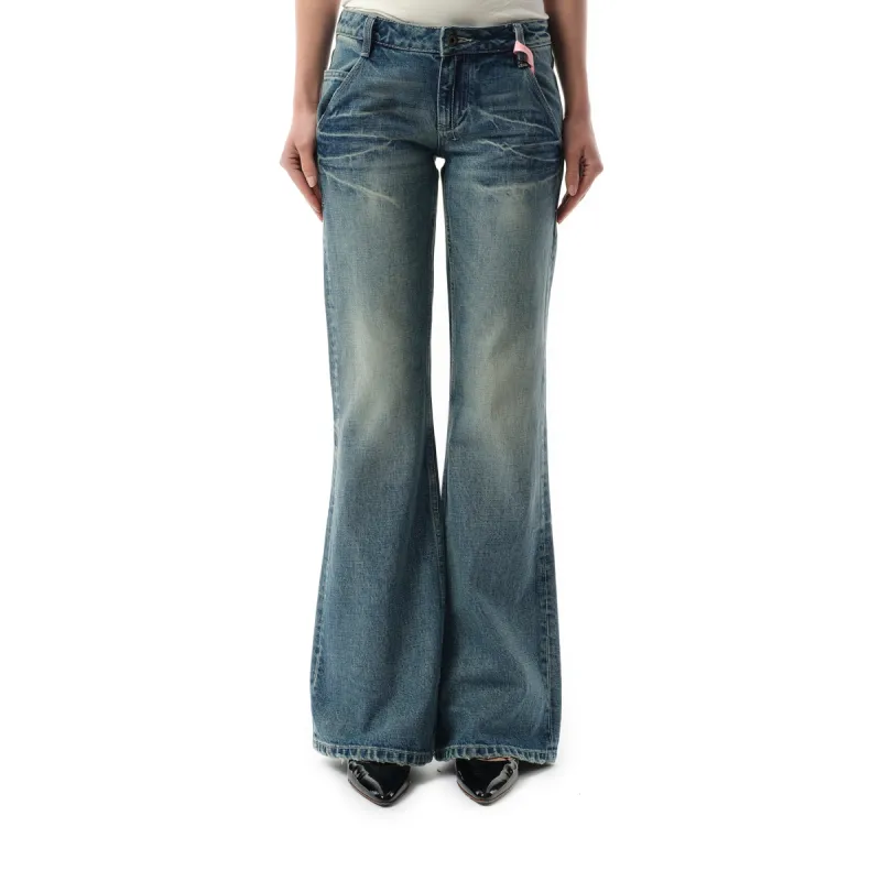 Low-rise Slim Fit Flared Jeans in Light Blue sold by MARAIS