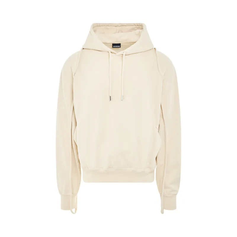 Camargue Warped Logo Hoodie in Light Beige sold by MARAIS