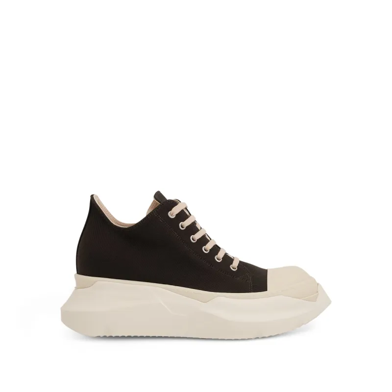 DRKSHDW Abstract Low Denim Sneakers in Dark Dust/Milk sold by MARAIS