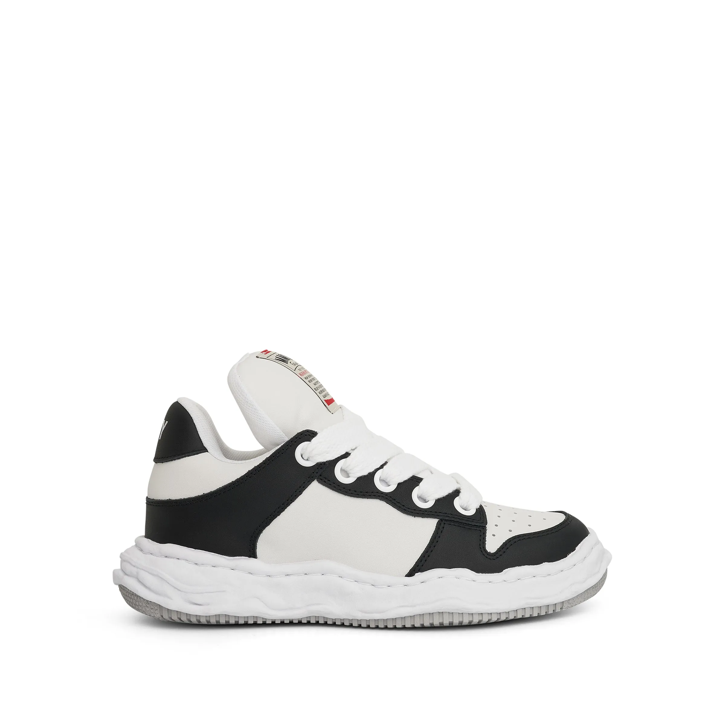 Wayne OG Puffer Sneaker in Black/White sold by MARAIS