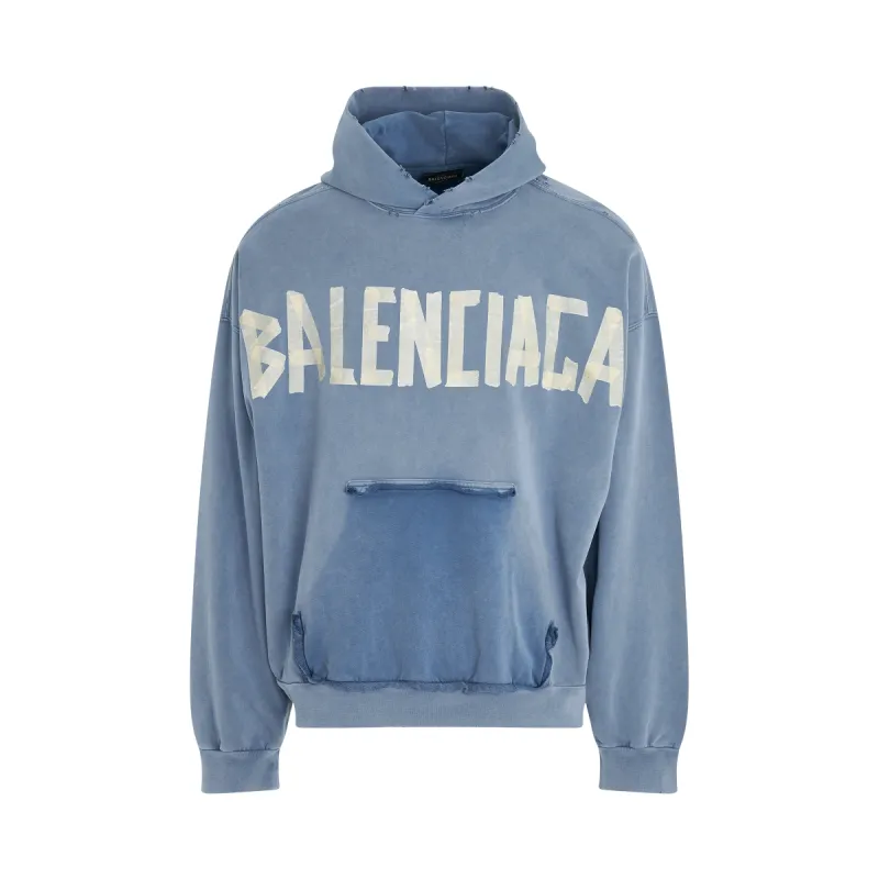 Tape Logo Ripped Pocket Hoodie in Faded Blue sold by MARAIS