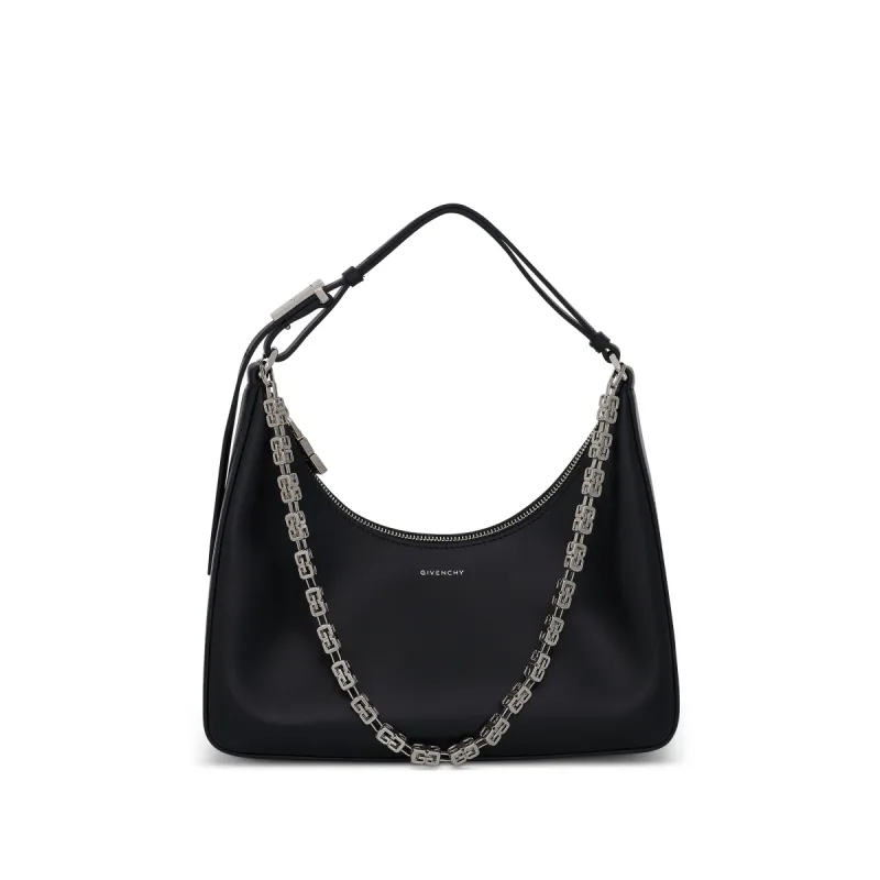 Small Moon Cut Out Bag in Calf Leather in Black sold by MARAIS